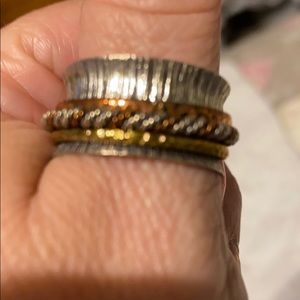 Spinning ring with gold, copper,,silver rings.